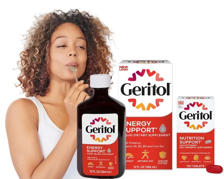 Woman happily taking Geritol Energy Support